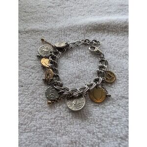 Dolce gabbana bracelet With 15 charms great condition,  8.5" long Heavy Piece